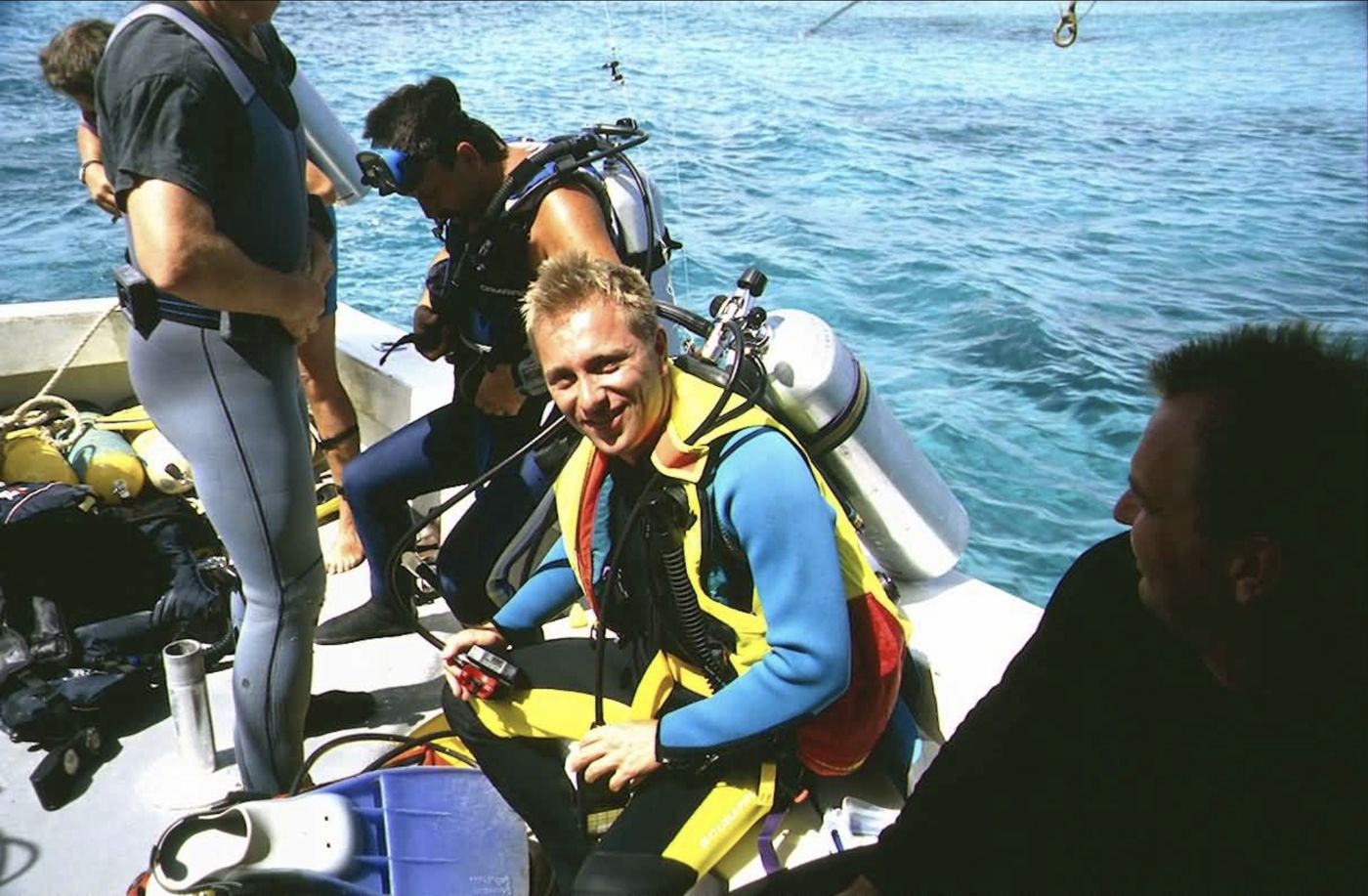Divers in gear on a boat